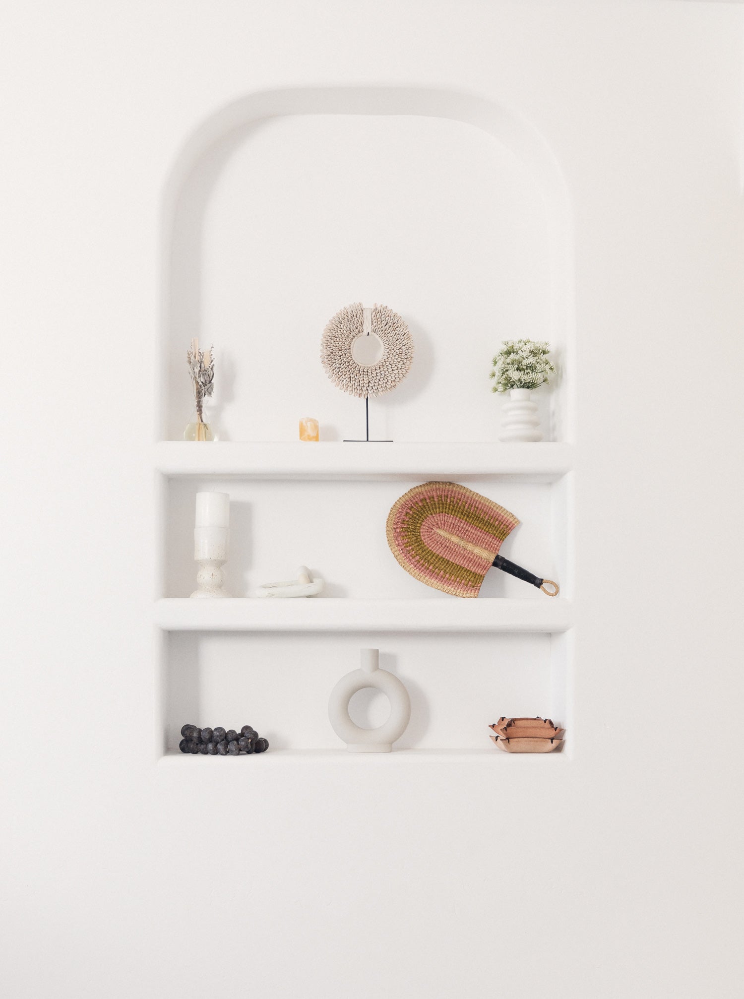 picture of shelf designed with stunning decor designed by cozy dwellings interior design services